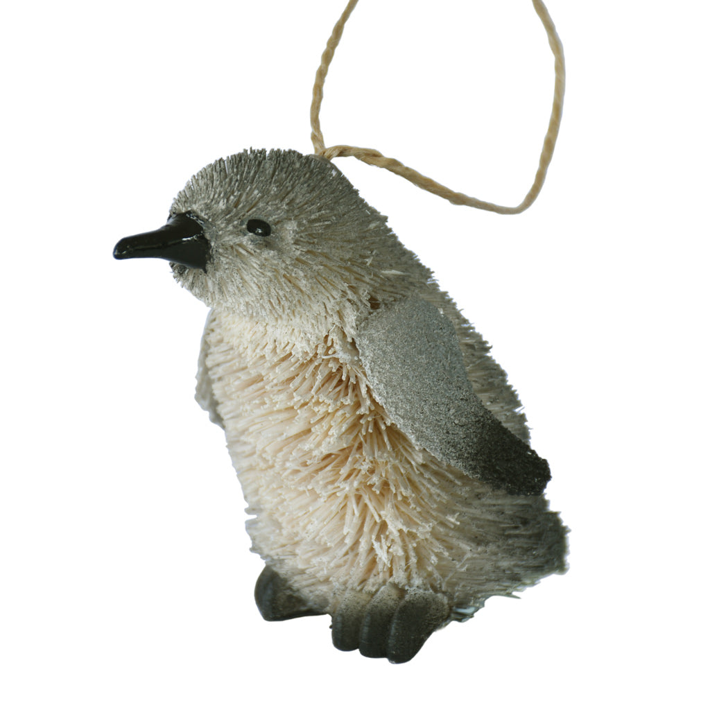 Buri fibre penguin ornament on a white background